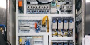 What is the definition of Programmable Logic Controller or "PLC"?